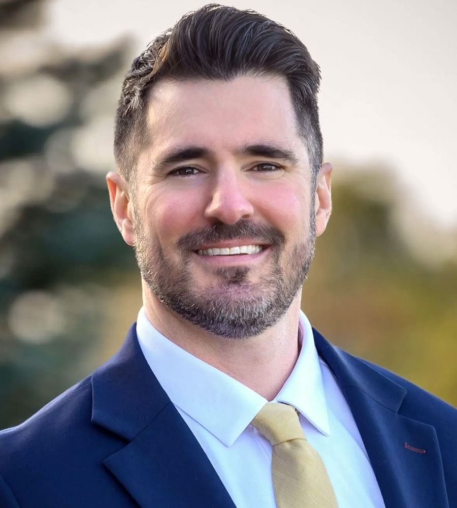 headshot of Adam Ferrari
