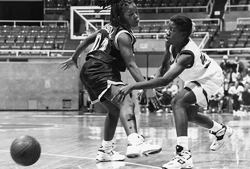 A photo shows Northern playing basketball here at the University of Illinois as a college athelete.