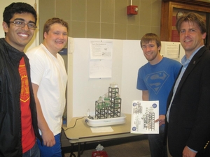Professor and Department Head Paul Kenis with students at the design project presentations.