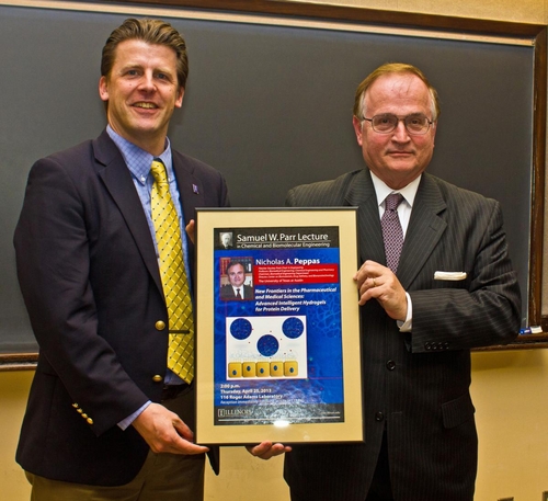 Professor Nicholas A. Peppas (right) and Professor and Department Head Paul. J.A. Kenis