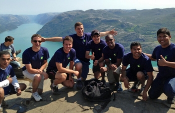 The BP Ultimate Field Trip winners standing atop Preikestolen (Pulpit) Rock overlooking Lysefjord in Norway.