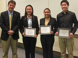 The winner's of this year's symposium stand with Dr. Paul J. A. Kenis (from l to r): Lily Chen, Heeral Patel, and Wei Jan.