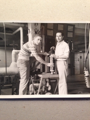Sant'Angelo and a fellow student with their pilot plant operation.