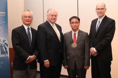 Feng Sheng Hu, Associate Dean, College of Liberal Arts & Sciences; Professor Richard C. Alkire, Charles and Dorothy Prizer Chair Emeritus; Hong Yang, Richard C. Alkire Professor in Chemical Engineering; and Interim Provost Edward Feser.