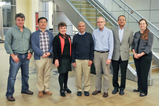 Members of the EBICS team, left to right: Gabriel Popescu, UI professor of electrical and computer engineering; Hyunjoon Kong, professor of chemical and biomolecular engineering; Martha Gillette, UI professor of cell and developmental biology; Taher Saif, UI professor of mechanical science and engineering; EBICS Director Roger Kamm of MIT; Rashid Bashir, UI professor and head of the department of bioengineering; program coordinator Carrie Kouadio, a visiting program coordinator in the Micro and Nanotechnology Lab. Photo by Gregory Pluta