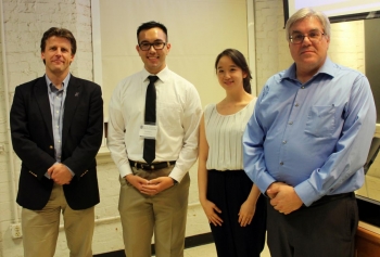 Department Head Paul Kenis and judge John Gohndrone with Daniel Bregante (first place, poster) and Emily Chen (third place, poster) Not pictured: Second-place poster winner Kai-Wen Hsiao.