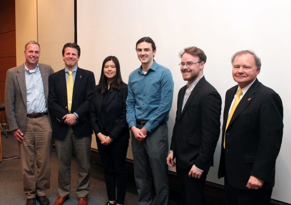 Judge Dan Hanus, Department Head Dr. Paul Kenis, symposium winners Qihua Chen, Elijah Karvelis and Marko Ivancevic, and judge Joe Drago (BS &amp;amp;rsquo;72)