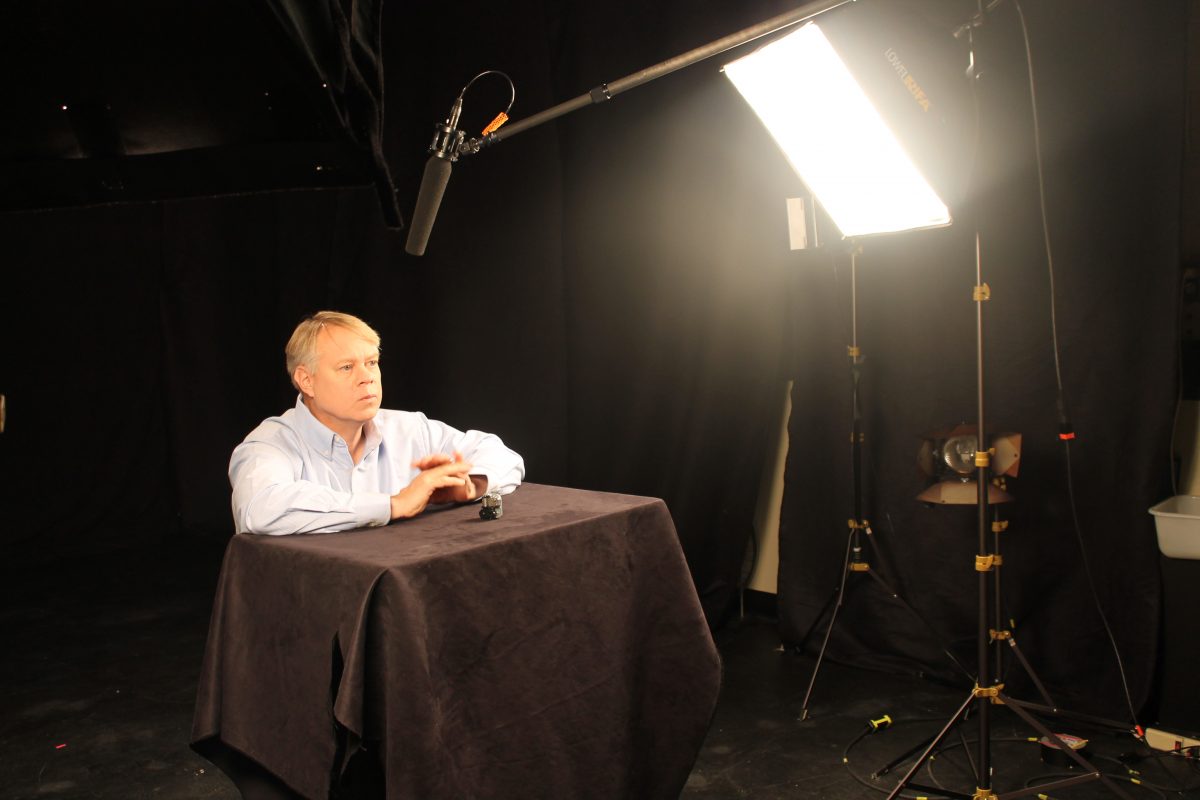 Hammack films a YouTube video in his studio.