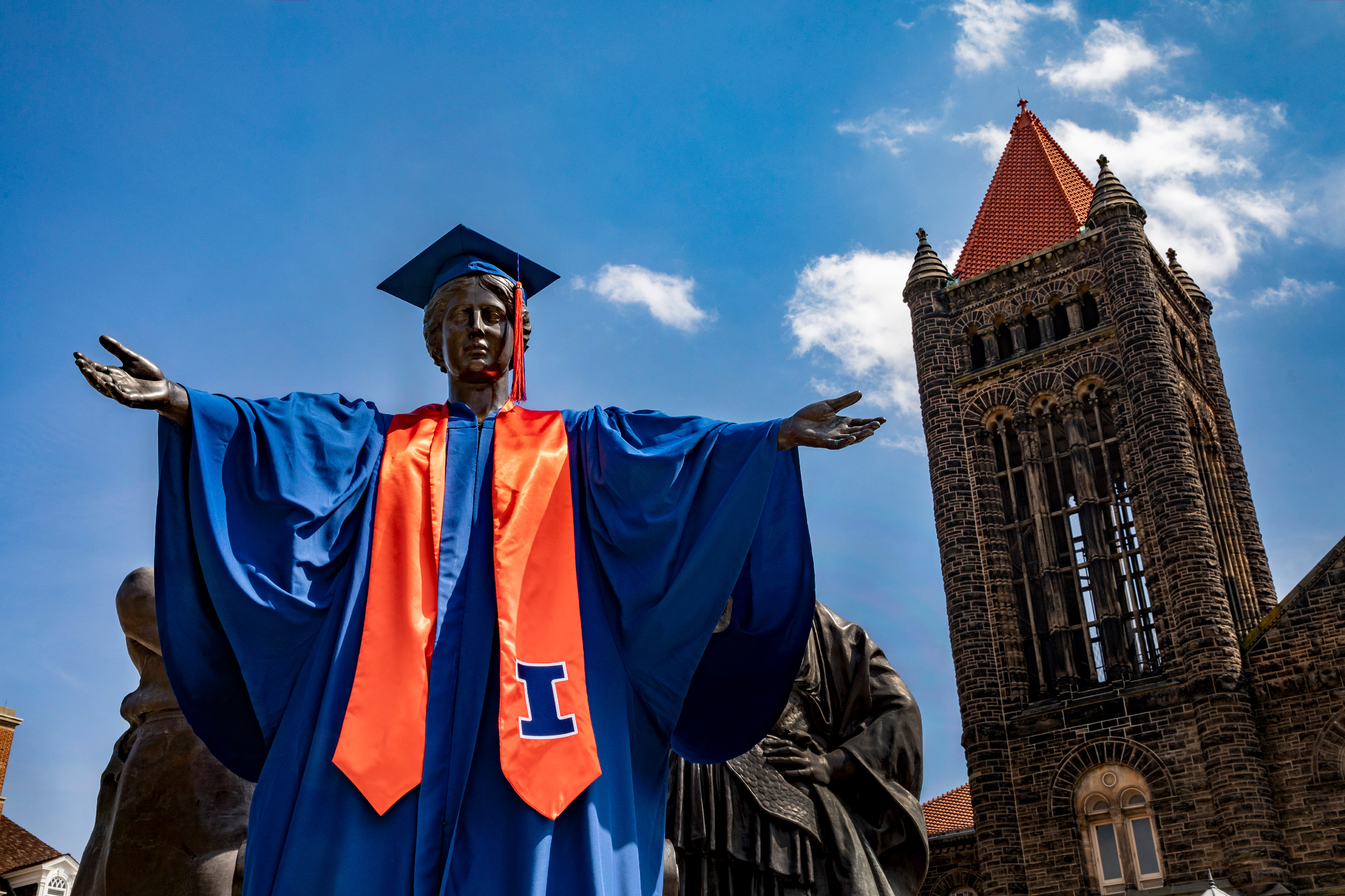 Alma Mater dressed in graduation regalia.