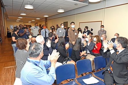 Attendees recognize graduate students who have received fellowships over the past two years.&nbsp;