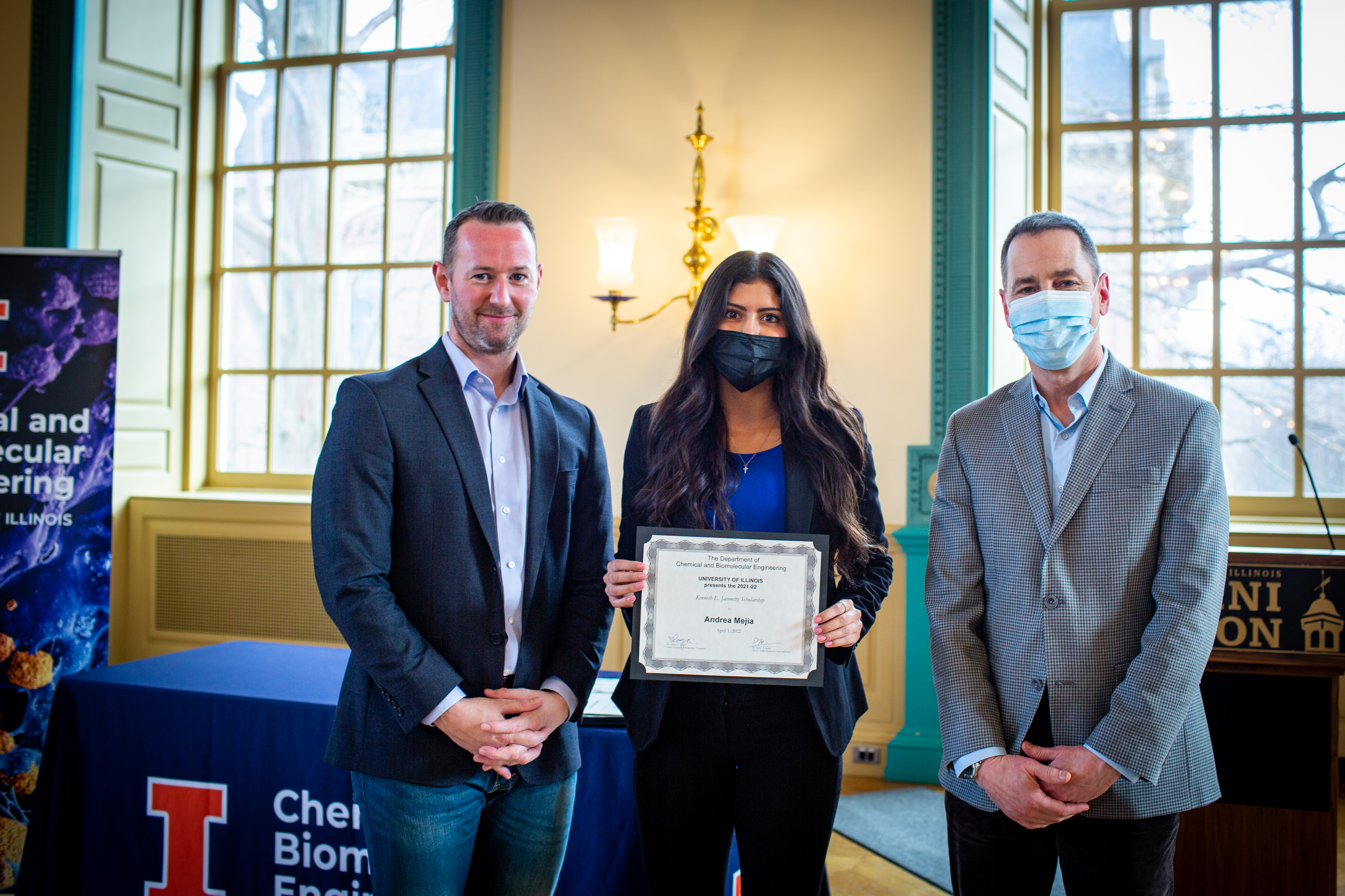 From left: professor Simon Rogers, Andrea Mejia, and alumnus Kenneth Jaconetty