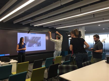 Laura Flessner shoots an introductory video of the innovation space she created.