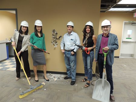 Laura Flessner (green shirt) on the first demolition day to build the new innovation space.