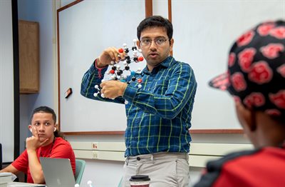 man showing campers moleucules