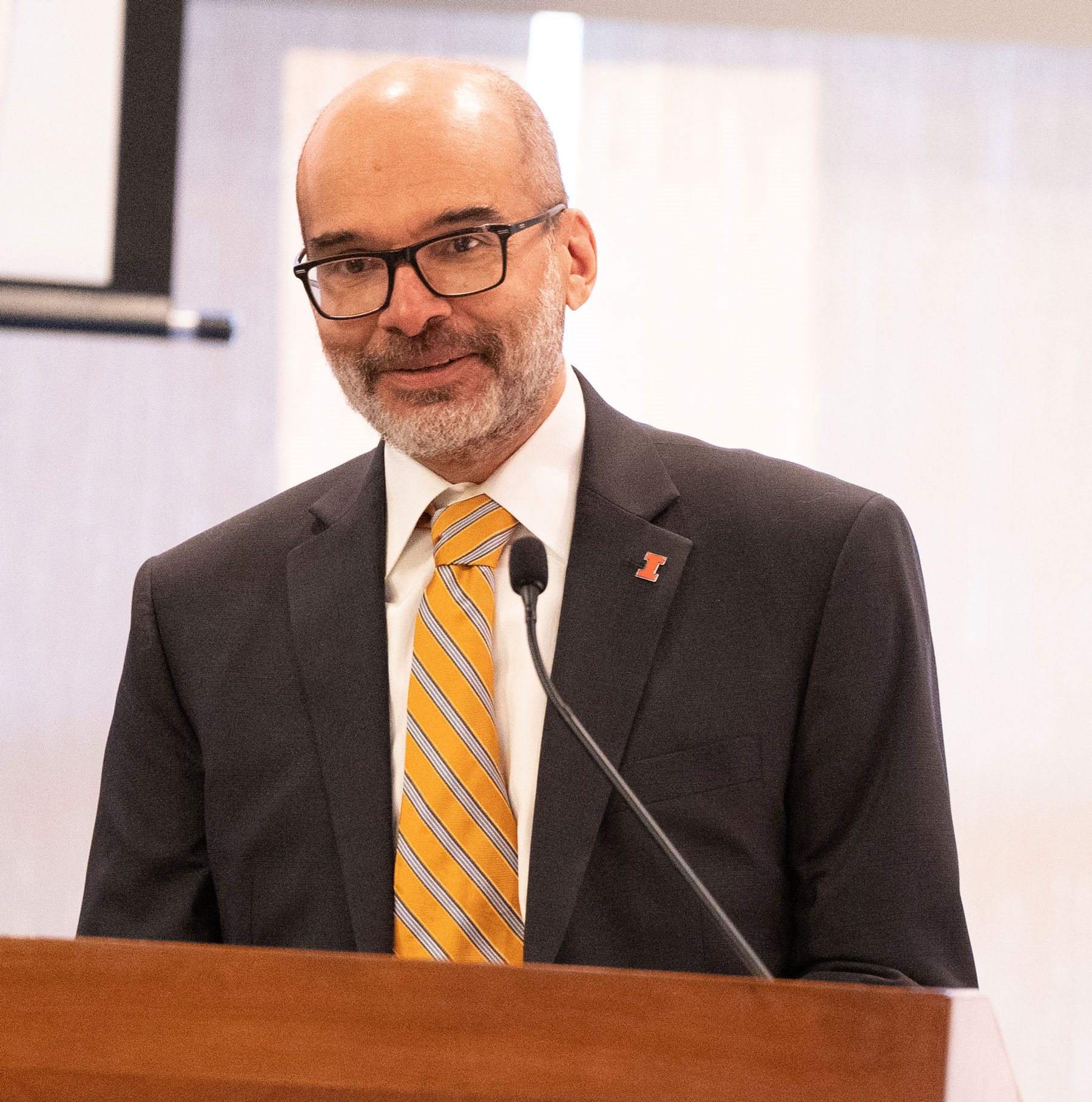 Department head Christopher&nbsp;Rao makes remarks during the investiture ceremony.