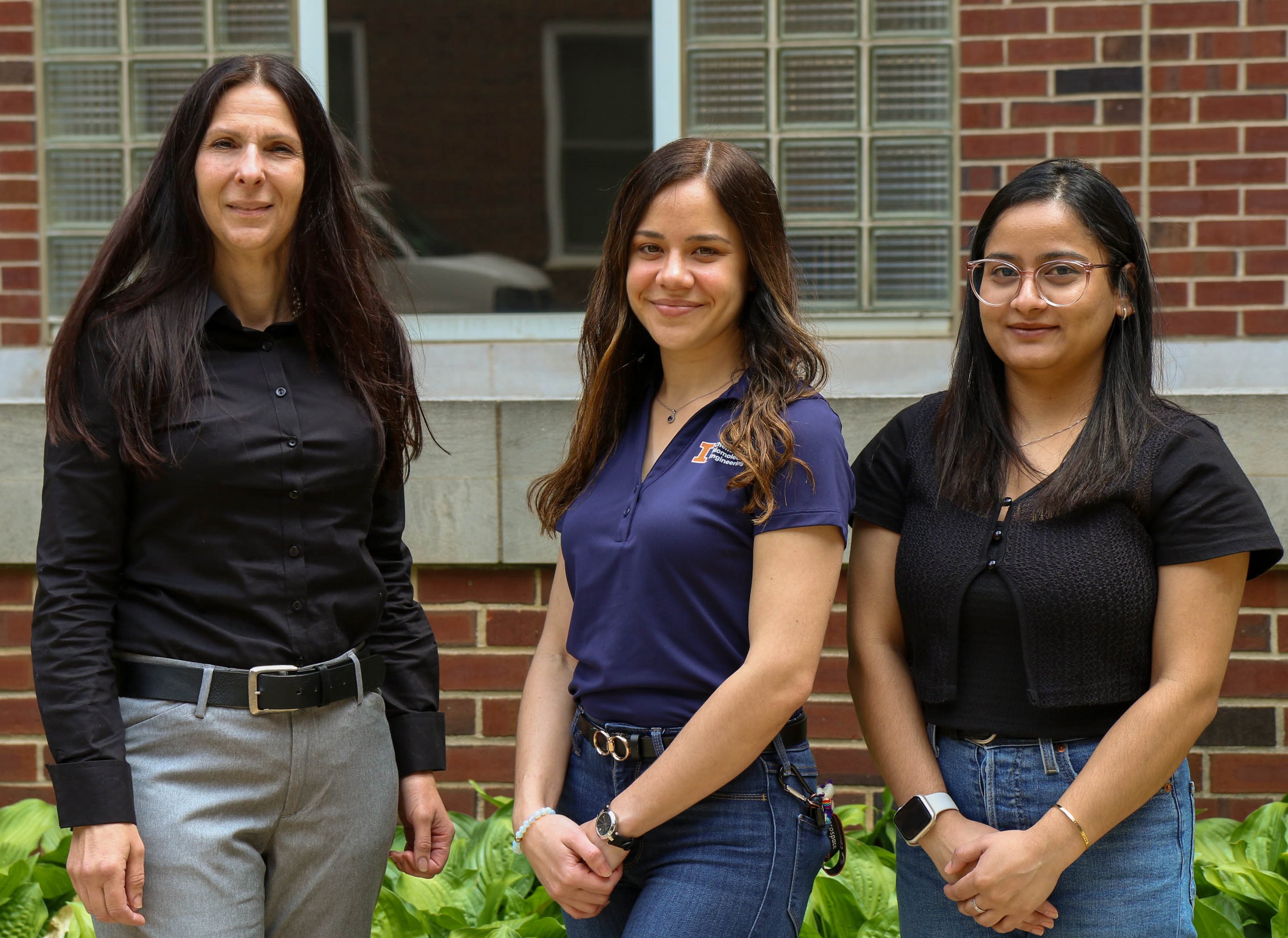 Mary Kraft and grad students Melanie Brunet and Sonji Lamichhane.