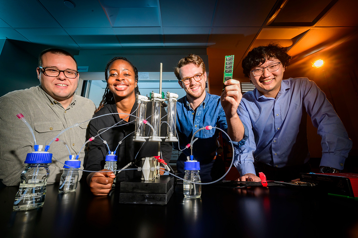 Researchers Johannes Elbert, left, Aderiyike Faniyan, Stephen Cotty and professor Xiao Su.  Photo by Fred Zwicky